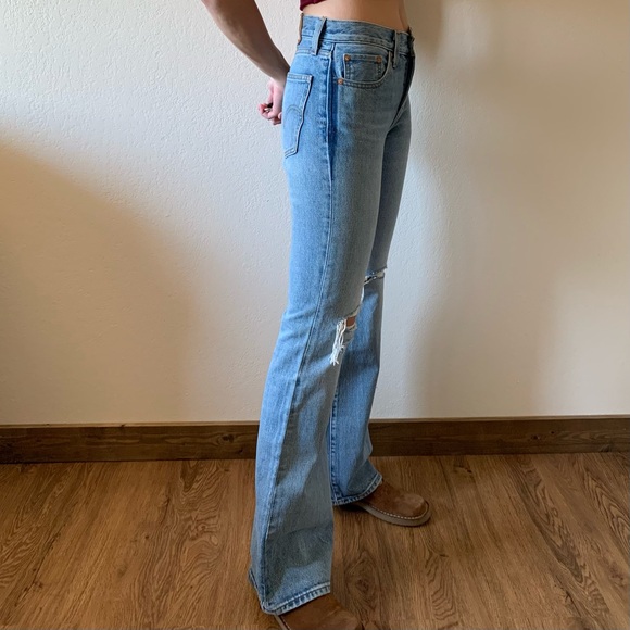 Levis Strauss Ripped High Rise Boot Cut Jeans Medium Wash Size 25 - Picture 4 of 11